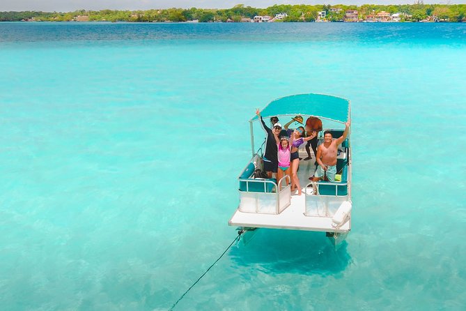 1 Day Tour to Bacalar, Cenotes and 7 color Lagoon with lunch from Cancun - Cenote Azul breakfast: outdoors, big scale, and a key swim rule