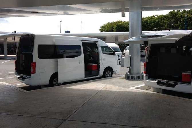 Airport Transfers to Puerto Morelos - Private van (ROUND TRIP) FLAT RATE - Meeting Your Driver at Cancun Airport: Banner Signs and Fast Messaging