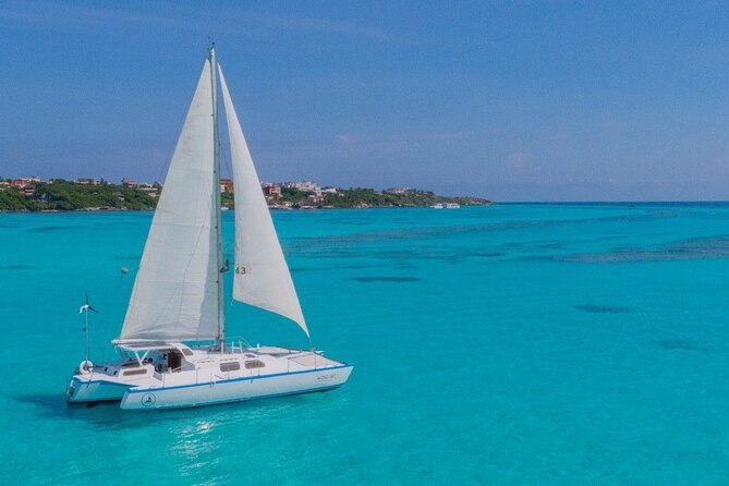 Amazing Catamaran to Isla Mujeres for the best price - Spinnaker Flying Over the Caribbean: The Adrenaline Moment