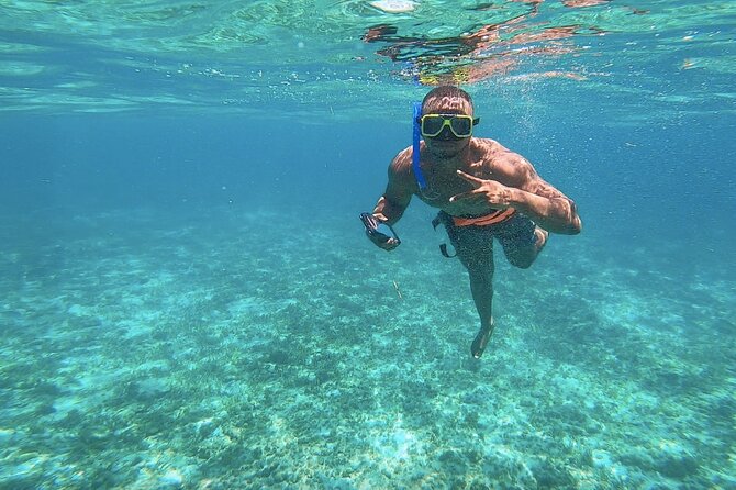 Amazing Catamaran to Isla Mujeres for the best price - Beach Club Time in Isla Mujeres: Calm Water, Buffet Lunch, and Open Bar