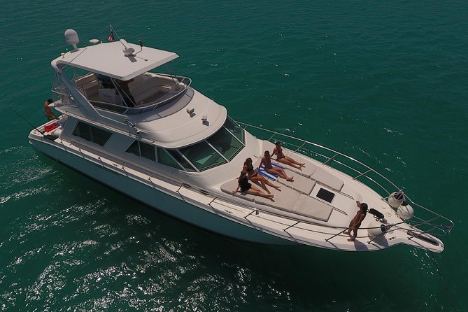 Cancun Boat Tour to Isla Mujeres on Luxury Yacht with Chef -SR55C - Fishing and snorkel time from a yacht-style schedule