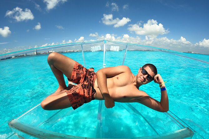 Cancun Clear Boat Tour Explore Nichupte and the Cancun Sea - Stop 2: The Caribbean Sea and coral viewing from the window