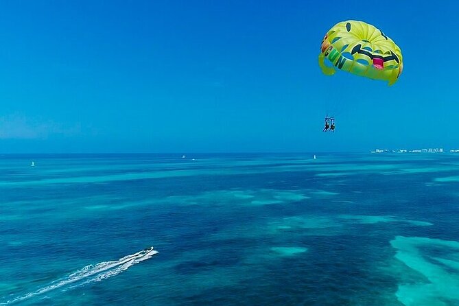 Cancun Combo Adventure: 4 Reef Snorkeling Stops & Parasailing - Four Mayan Reef snorkeling stops: art, turtles, and a sunken ship