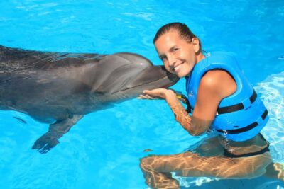 Cancun: Interactive Aquarium Ticket and Swim with Dolphins - The real centerpiece: 30 minutes in the water with your dolphin host