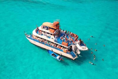 Cancun: Isla Mujeres Full Day Dancer Cruise - Your day’s first swim: Meco Reef and snorkeling reality