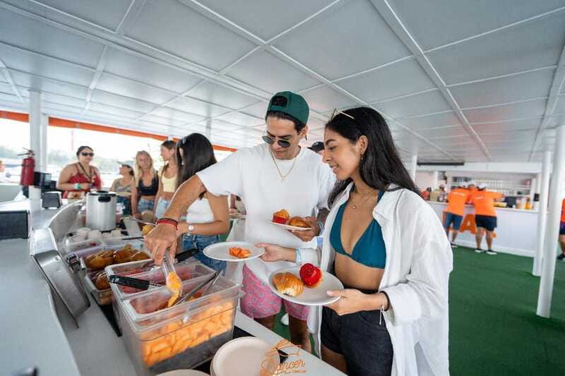 Cancun: Isla Mujeres Full Day Dancer Cruise - Zaza Yacht & Beach Club stop: drinks included, and one hour to reset