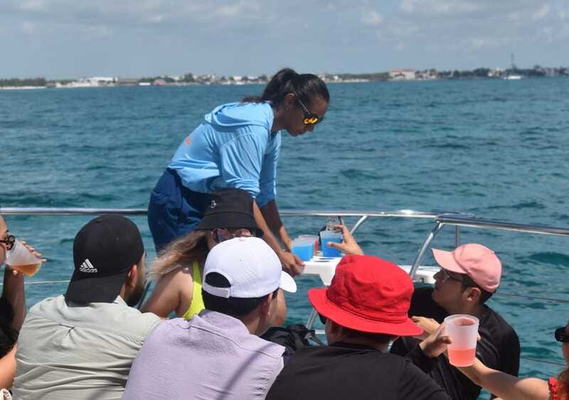 Cancun: Isla Mujeres Only Adults Catamaran, drinks & snorkel - Snorkeling at El Meco Reef: coral, fish, and the weather reality