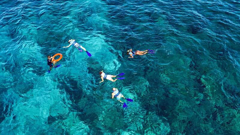 Cancun: Isla Mujeres Premium Catamaran Half-Day Tour - Snorkeling stop: how to set expectations for the water time