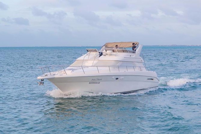 Cancun Yacht Tour - SEARAY YACHT 46 FT GREAT FOR SUNSET 15 PEOPLE MAX 25P9 - Crew Service, Safety Gear, and the Bluetooth Speaker Setup