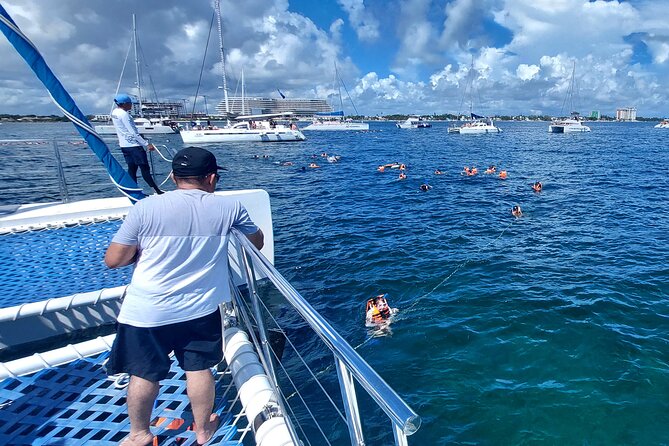 Catamaran Adventure Isla Mujeres with Snorkeling and Beach Club - El Meco reef snorkeling: beginner-friendly, weather-dependent