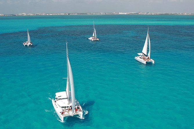 Catamaran adventure to Isla Mujeres with Snorkel,Buffet,Open Bar and Beach Club - Lunch, Drinks, and What to Do While You Wait for Conditions