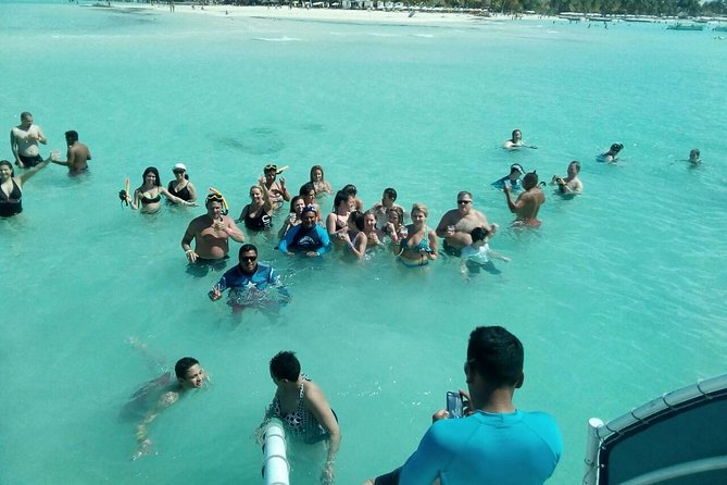 Catamaran Adventure Tour Isla Mujeres Unlimited from Cancun with Transportation - On the Catamaran: Open Bar, Tequila Party, and On-Board Fun