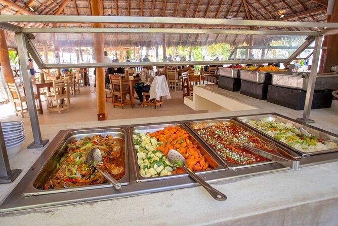 Catamaran family friendly Tour to Isla Mujeres with lunch - First stop: El Meco Reef and Museo Subacuatico de Arte snorkeling time