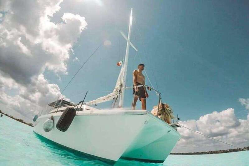 Catamaran party Isla Mujeres with drinks & lunch - Out on the Caribbean: snorkeling time and the scenic cruise stretch