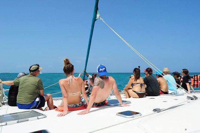 Catamaran Sail and Snorkeling Tour with Open Bar in Puerto Morelos - From Your Hotel to Marina El Cid: How the Day Starts