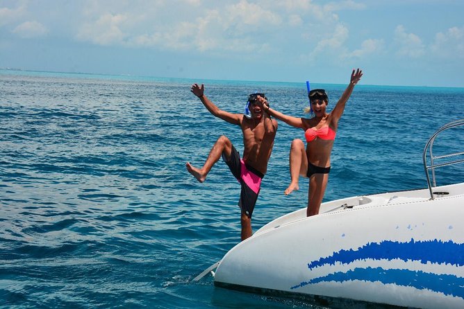 Catamaran Sail to Isla Mujeres with all inclusive from Cancun or Riviera Maya - Time in Isla Mujeres town: shops, walking, and optional golf carts