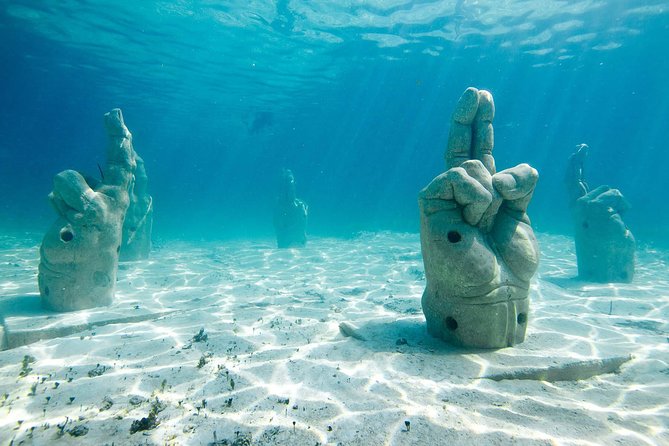 Catamaran Sailing Experience & Snorkeling Tour to Isla Mujeres - The extra cost you must plan for: Reef Conservation Tax