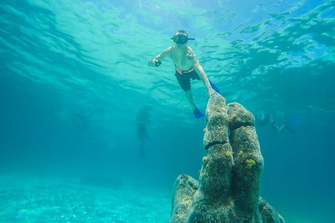 Catamaran Sailing & Snorkeling Experience Isla Mujeres from Playa Del Carmen - Food, drinks, and the onboard vibe (including the one thing to expect)
