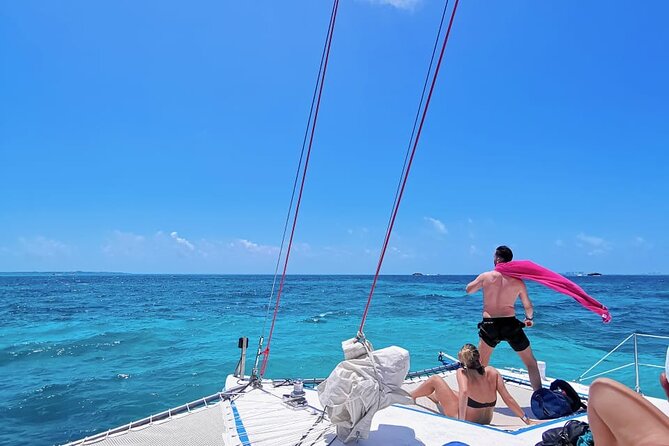 Catamaran to Isla Mujeres, Open bar, buffet, Beach Club Included - Key points that matter before you go