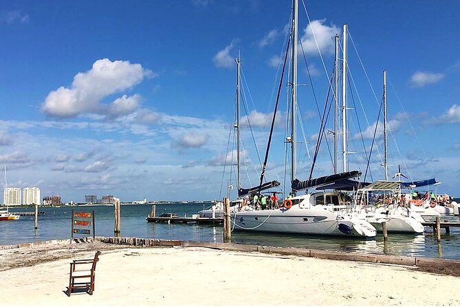 Catamaran to Isla Mujeres, Open bar, buffet, Beach Club Included - Walking toward Punta Norte and Isla shopping momentum