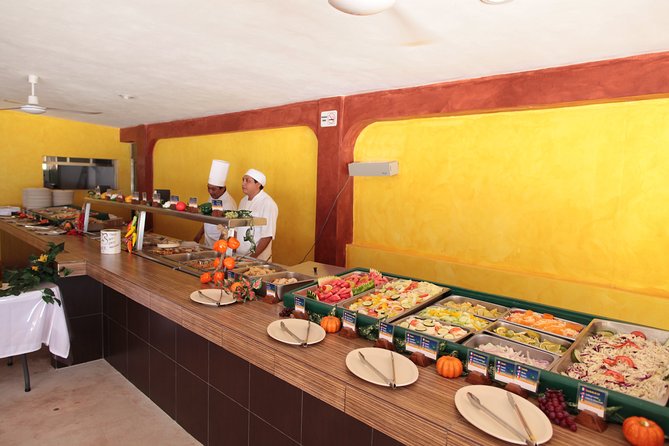 Catamaran to Isla Mujeres: Snorkel MUSA, Playa Norte & Buffet - Playa Norte Beach Club: Buffet, Drinks, and the Real Value of This Stop