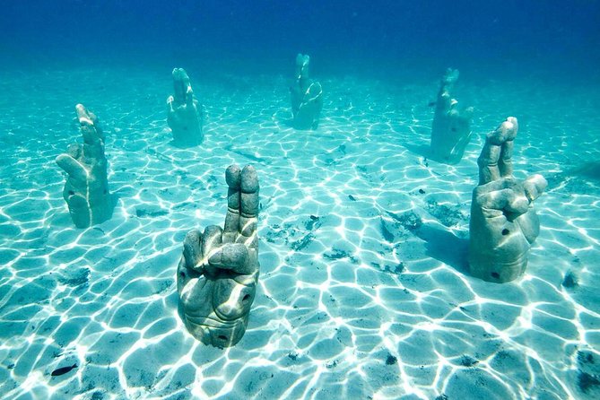 Catamaran Tour to Isla Mujeres from Cancun or Riviera Maya - Spinnaker sail vs snorkeling: how to set expectations for the weather