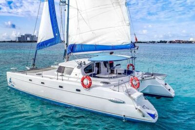 Catamaran Tour to Isla Mujeres from Cancún with Bar and Lunch - Price reality check: $38 plus the mandatory $45 dock fee