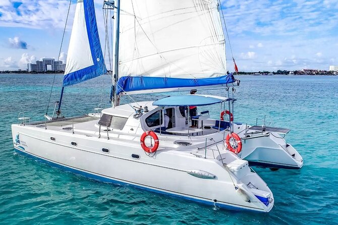 Catamaran Tour to Isla Mujeres from Cancún with Bar and Lunch - Price reality check: $38 plus the mandatory $45 dock fee