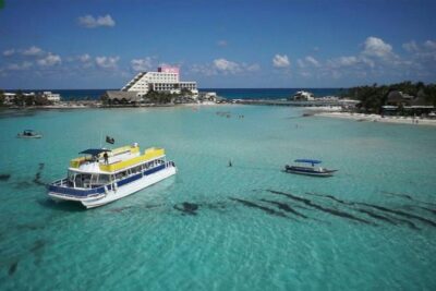 Catamaran Unlimited Adventure to Isla Mujeres" From Cancun - Isla Mujeres First View: How the Cruise Turns Into Island Exploration