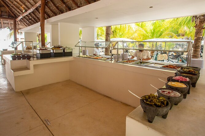 Deluxe Catamaran tour to Isla Mujeres with Open Bar and Lunch - Isla Mujeres downtown pier: how to spend your one-hour break