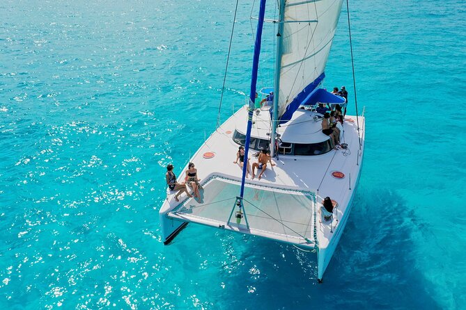 Discover Isla Mujeres: Catamaran, Snorkeling, and "Ice Bar" - Isla Mujeres Free Time + Beach Club Lunch (With Vegan Options)
