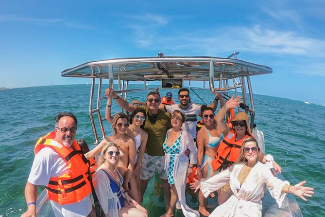 Excursion to Reefs in a transparent boat from Cancun - Caribbean Sea Transfer: When the Tour Shifts From Lagoon to Open Water
