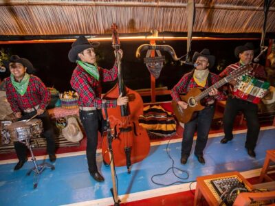 From Cancun: All-Inclusive Xoximilco Park Admission - Entering the Mexican fair: dancing, sweets, and a place to start
