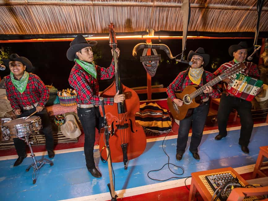 From Cancun: All-Inclusive Xoximilco Park Admission - Entering the Mexican fair: dancing, sweets, and a place to start