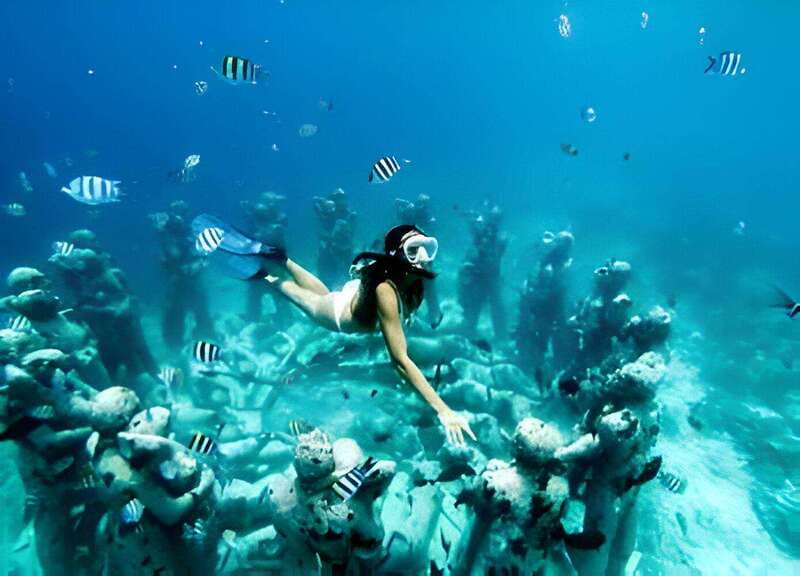 From Cancun: Isla Mujeres by Luxury Catamaran with Drinks - Isla Mujeres swimming and snorkeling: what you’ll actually do