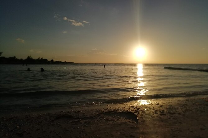 Full Day Tour of Isla Holbox and Isla Pasión with Cenote - Stop 3: Holbox Island’s Beach Time, Sunset Energy, and Bicycle Hour