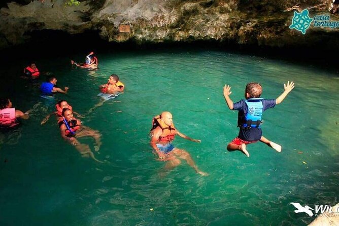 Full Day Tour to 5 Magical Cenotes in the Riviera Maya - Calle Cenote Sagrado: buffet lunch, showers, and platform jumping time