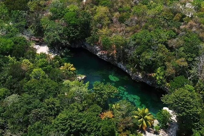 Full Day Tour to 5 Magical Cenotes in the Riviera Maya - Stop 1 in Tulum: AAK Cocina de Origen fire show and the Tulum letters photo