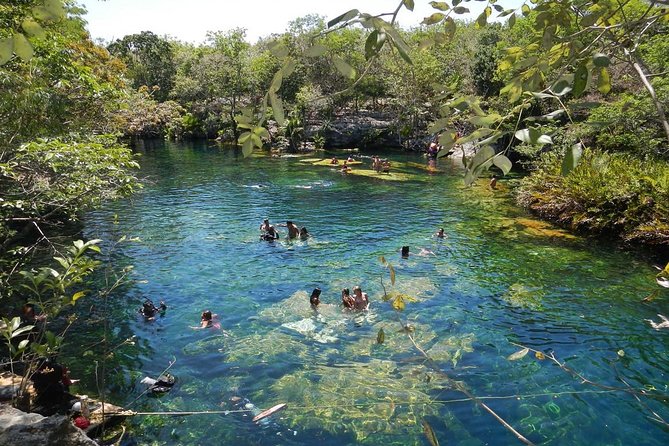 Full day tour to BACALAR, Beach Club, Kayak and an amazing Cenote - Cenote Azul: a sinkhole swim with real wow-factor