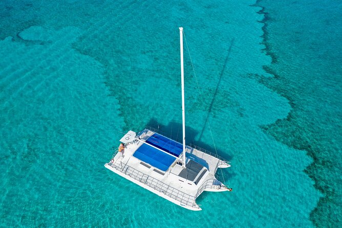 HipHop Catamaran Party from Cancun to Isla Mujeres - Transportation, pickup timing, and the $40 dock/reef fee