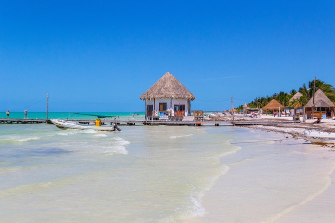 Holbox Island Tour from Cancun - Boat ride realities: comfortable views, but pack for the sea