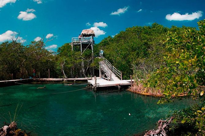 Holbox plus Island Magic by boat Tour from Cancun - Punta Mosquito reflections: the sky-mirror stop