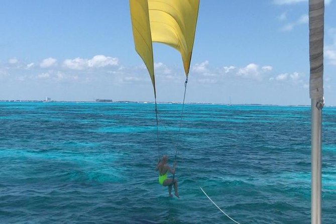 Isla Mujeres adventure by Catamaran. Snorkel, open bar and lunch - Isla Mujeres town time: souvenirs and an easy-paced break
