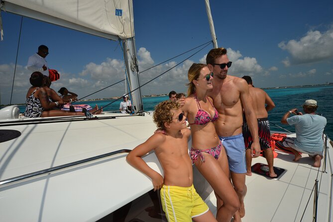 Isla Mujeres Catamaran from Cancun with Open bar and lunch - Beach club lunch after the swim: food, loungers, and pacing