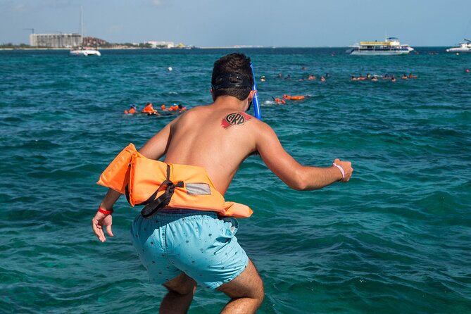 Isla Mujeres Catamaran from Cancun with Open bar and lunch - Price reality check: $29 tour cost plus mandatory $45 fees