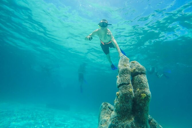 Isla Mujeres Catamaran Luxury Sailing Experience from Puerto Morelos - Isla Mujeres downtown (Calle Hidalgo): food, souvenirs, and fast wandering