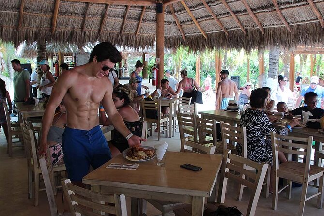 Isla Mujeres Catamaran! Party & Premier Beach Club (Adults Only) - Boarding day flow: what to expect onboard