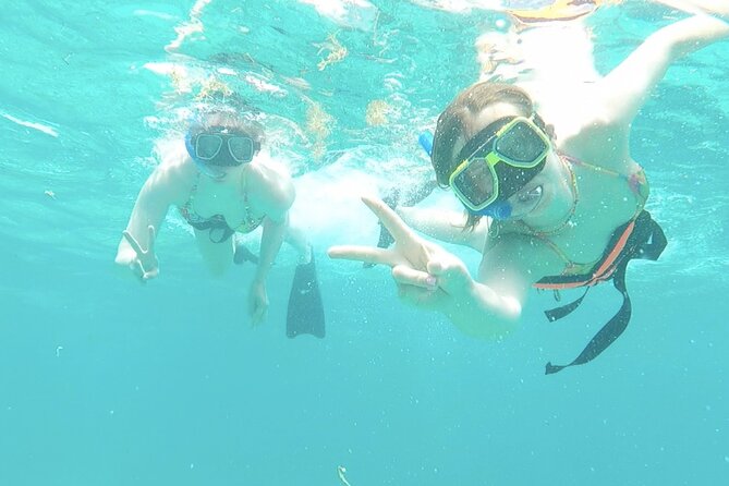 Isla Mujeres Catamaran Tour from Cancun with snorkel and Open Bar - The sail to El Meco Reef: sun time with an open-bar rhythm