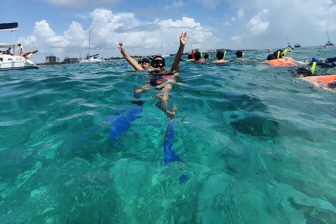 Isla Mujeres Catamaran Tour from Cancun with snorkel and Open Bar - Snorkeling at El Meco Reef (45 minutes): what to expect in real time
