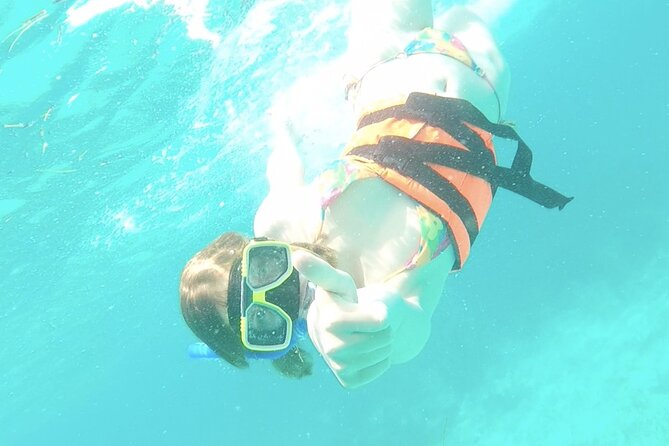 Isla Mujeres Catamaran Tour from Cancun with snorkel and Open Bar - Albatros Beach Club on Isla Mujeres (2 hours): the lunch-and-lounge reset